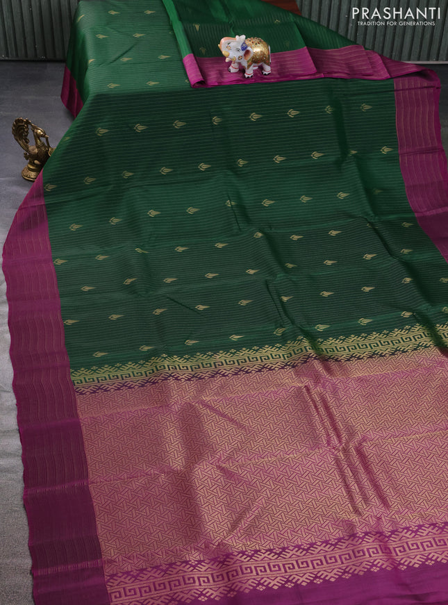 Kanchipuram silk saree dark green and purple with allover zari weaves and zari woven border