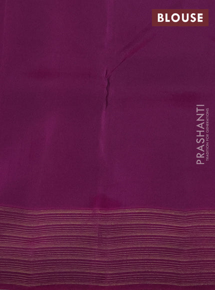 Kanchipuram silk saree dark green and purple with allover zari weaves and zari woven border