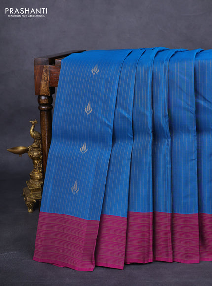 Kanchipuram silk saree peacock blue and purple with allover zari weaves and zari woven border