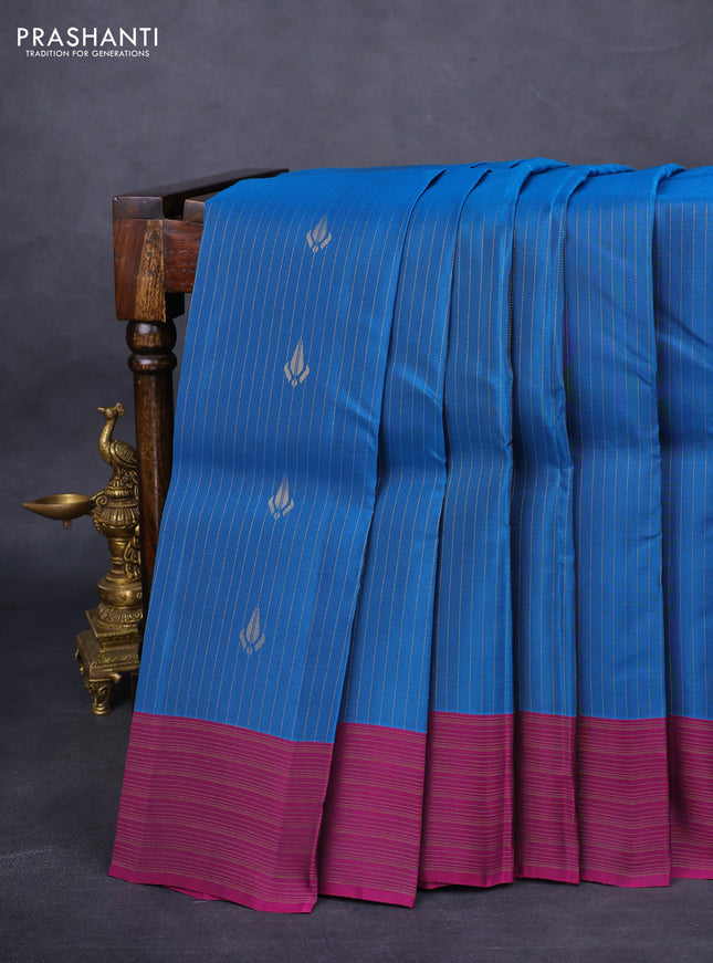 Kanchipuram silk saree peacock blue and purple with allover zari weaves and zari woven border