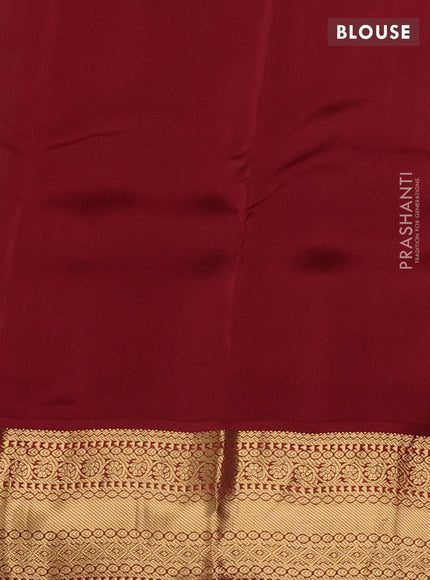 Kanchipuram silk saree green and maroon with allover zari weaves & buttas and zari woven korvai border