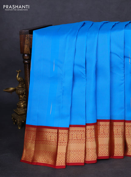 Kanchipuram silk saree cs blue and maroon with allover zari weaves & buttas and zari woven korvai border