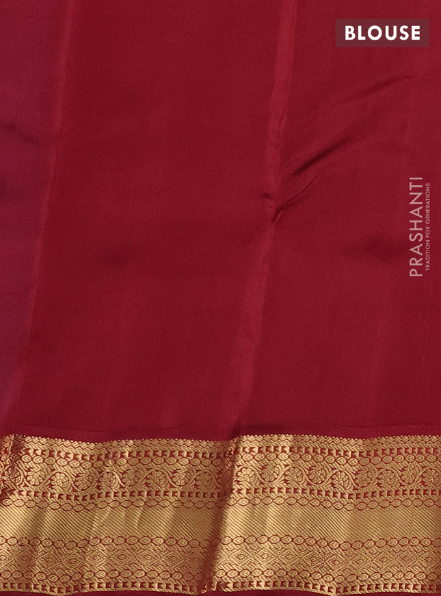 Kanchipuram silk saree cs blue and maroon with allover zari weaves & buttas and zari woven korvai border