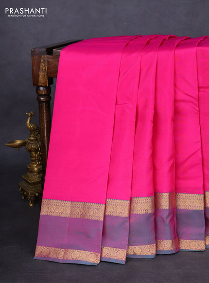 Kanchipuram silk saree pink and dual shade of teal green with plain body and rettapet zari woven border