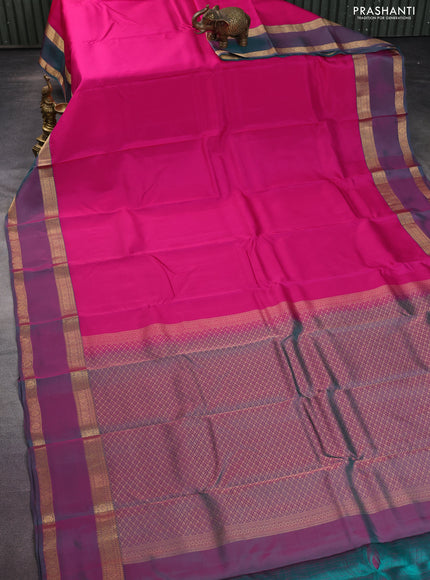 Kanchipuram silk saree pink and dual shade of teal green with plain body and rettapet zari woven border