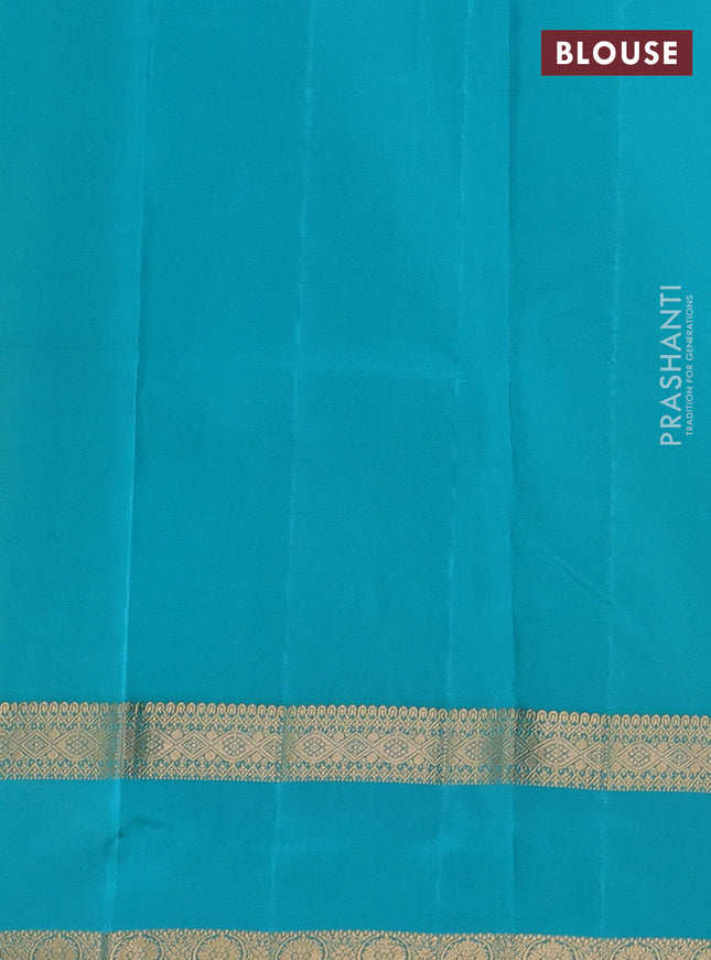 Kanchipuram silk saree dual shade of teal green and teal blue with plain body and rettapet zari woven border