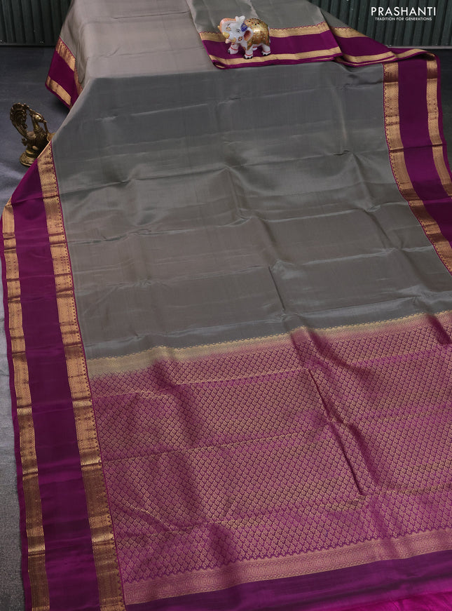 Kanchipuram silk saree grey and purple with plain body and rettapet zari woven border
