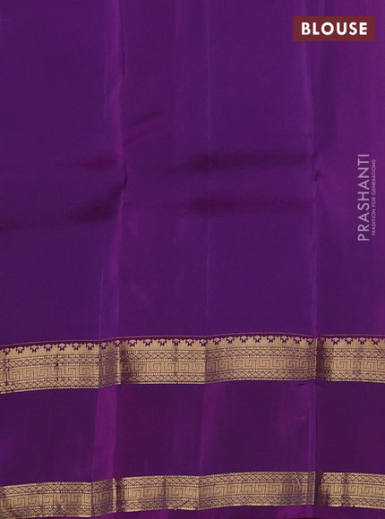 Kanchipuram silk saree dual shade of maroon and purple with plain body and rettapet zari woven border