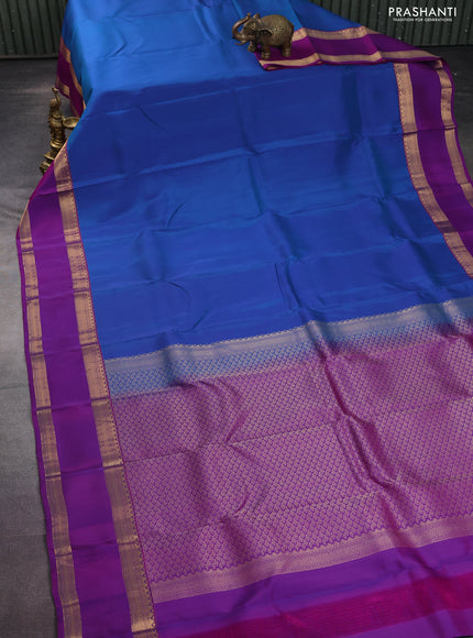 Kanchipuram silk saree cs blue and purple with plain body and rettapet zari woven border