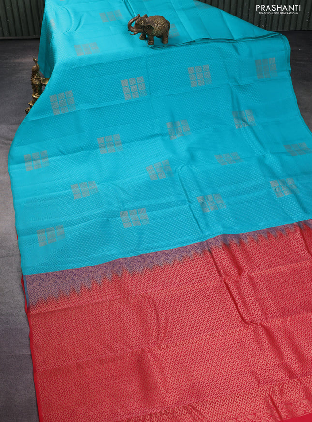 Kanchipuram silk saree teal blue and red with allover self emboss and zari butta border