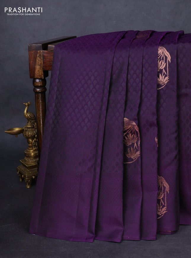 Kanchipuram silk saree deep violet and mustard yellow with allover self emboss and zari butta border