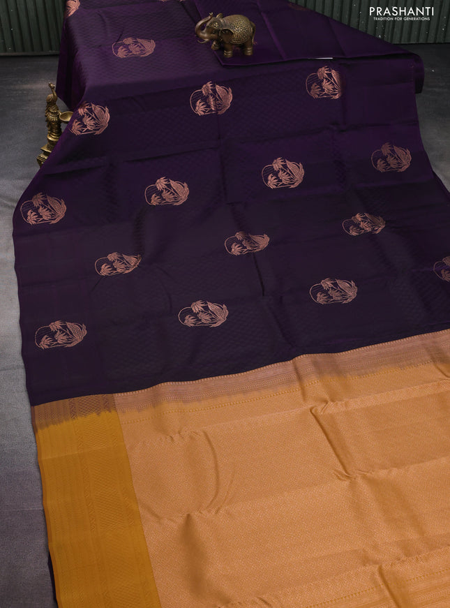 Kanchipuram silk saree deep violet and mustard yellow with allover self emboss and zari butta border