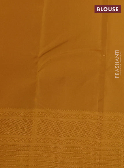 Kanchipuram silk saree deep violet and mustard yellow with allover self emboss and zari butta border