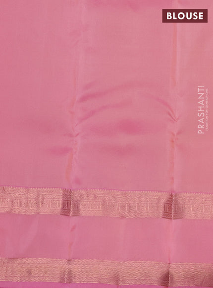 Kanchipuram silk saree pale yellow and peach pink with allover copper zari weaves and rettapet copper zari woven border