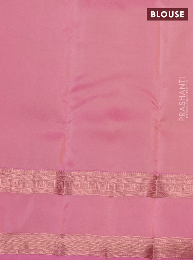 Kanchipuram silk saree pale yellow and peach pink with allover copper zari weaves and rettapet copper zari woven border