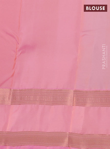 Kanchipuram silk saree pastel green and peach pink with allover copper zari weaves and rettapet copper zari woven border