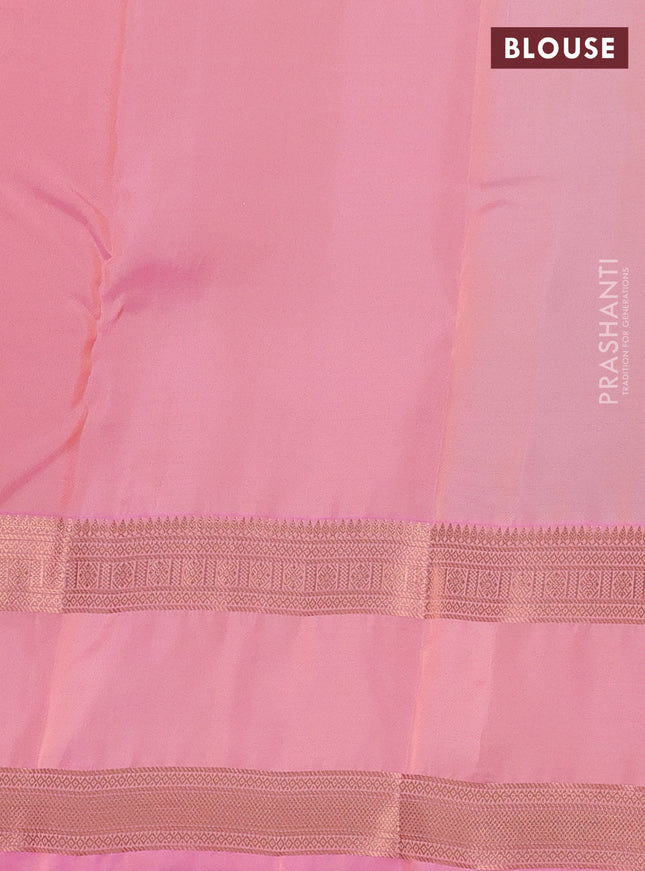 Kanchipuram silk saree pastel green and peach pink with allover copper zari weaves and rettapet copper zari woven border