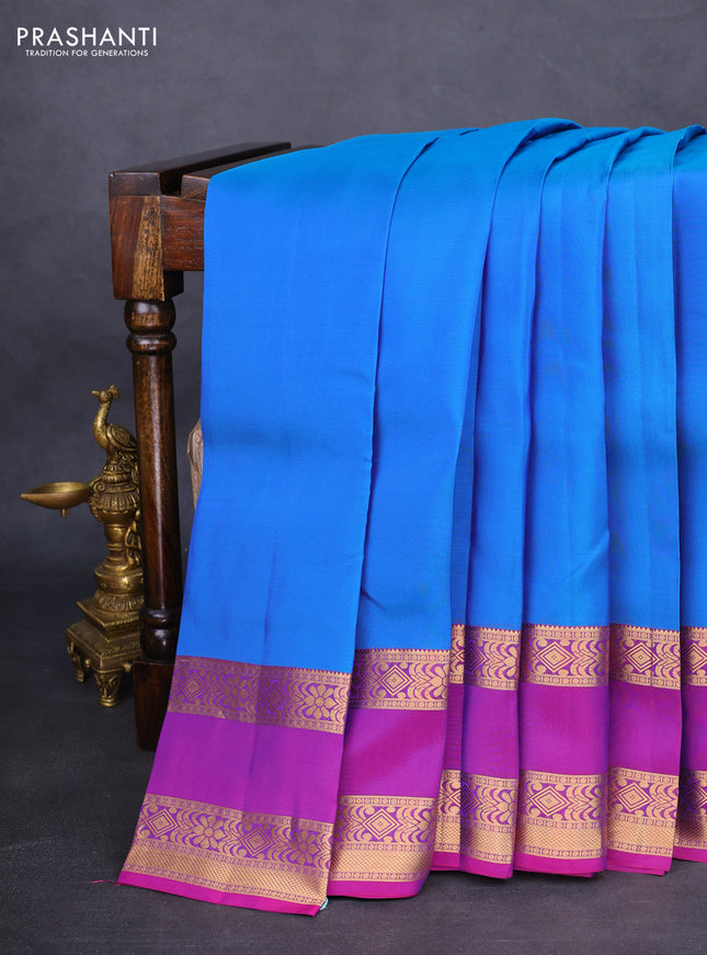 Kanchipuram silk saree dual shade of blue and purple with plain body and rettapet zari woven border