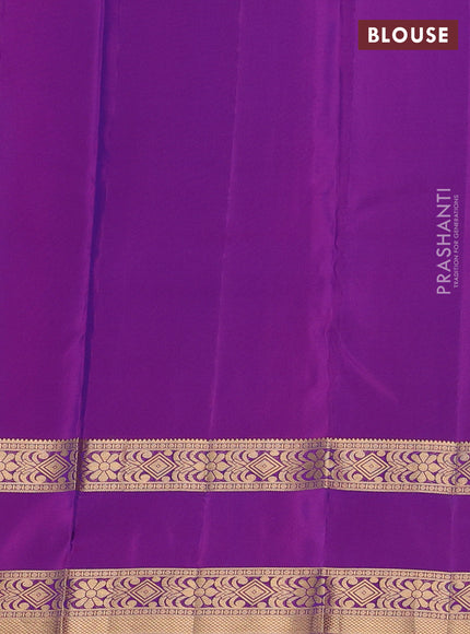 Kanchipuram silk saree dual shade of blue and purple with plain body and rettapet zari woven border