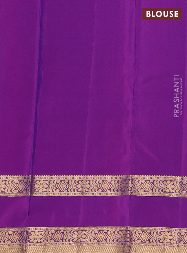Kanchipuram silk saree dual shade of blue and purple with plain body and rettapet zari woven border