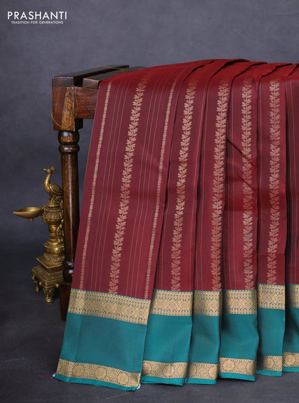 Kanchipuram silk saree deep maroon and teal green with allover zari weaves and rettapet zari woven border