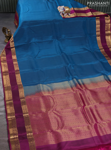 Kanchipuram silk saree peacock blue and purple with palin body and rettapet zari woven border