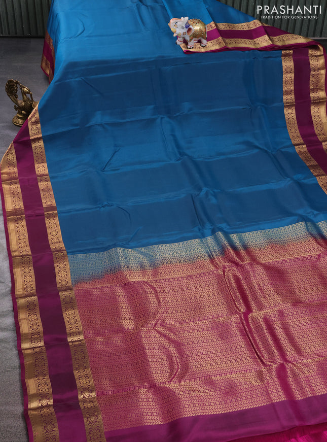 Kanchipuram silk saree peacock blue and purple with palin body and rettapet zari woven border
