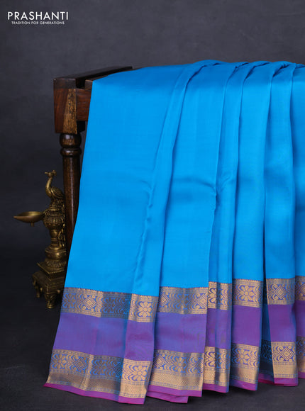 Kanchipuram silk saree cs blue and dual shade of purple with palin body and rettapet zari woven border