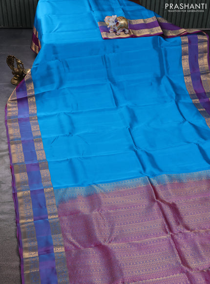 Kanchipuram silk saree cs blue and dual shade of purple with palin body and rettapet zari woven border