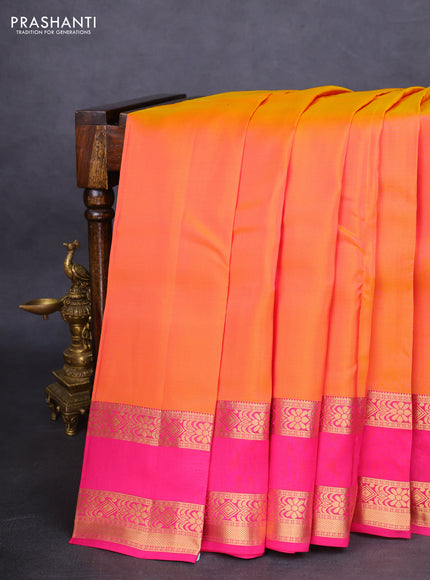 Kanchipuram silk saree dual shade of pinkish yellow and pink with palin body and rettapet zari woven border