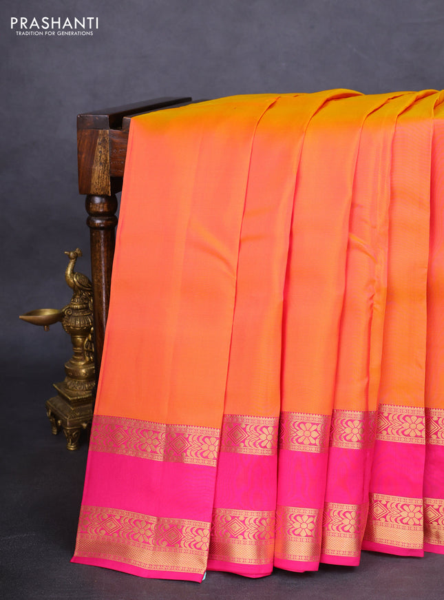 Kanchipuram silk saree dual shade of pinkish yellow and pink with palin body and rettapet zari woven border