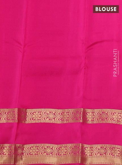 Kanchipuram silk saree dual shade of pinkish yellow and pink with palin body and rettapet zari woven border