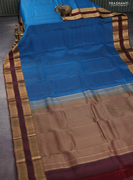 Kanchipuram silk saree cs blue and deep maroon with palin body and rettapet zari woven border