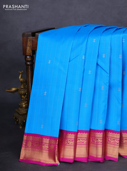 Kanchipuram silk saree cs blue and purple with allover zari weaves and zari woven korvai border