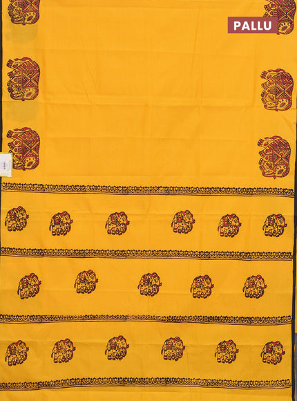 Semi silk cotton saree mango yellow and black with elephant butta prints and piping border