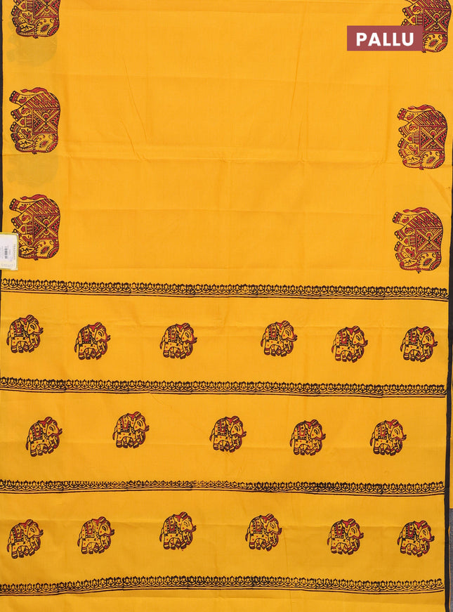 Semi silk cotton saree mango yellow and black with elephant butta prints and piping border