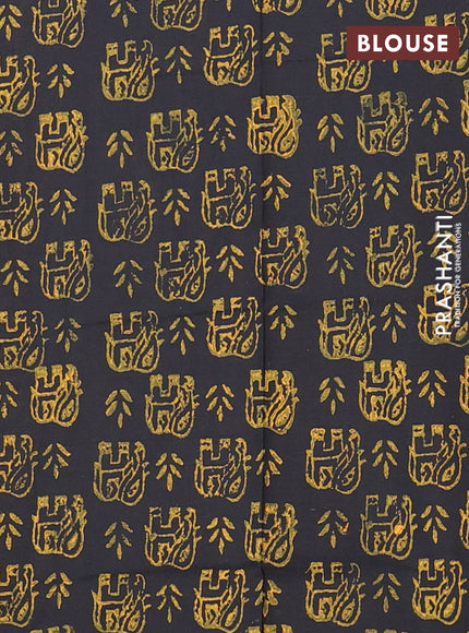 Semi silk cotton saree mango yellow and black with elephant butta prints and piping border