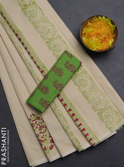 Semi silk cotton saree cream and light green with butta prints in borderless style