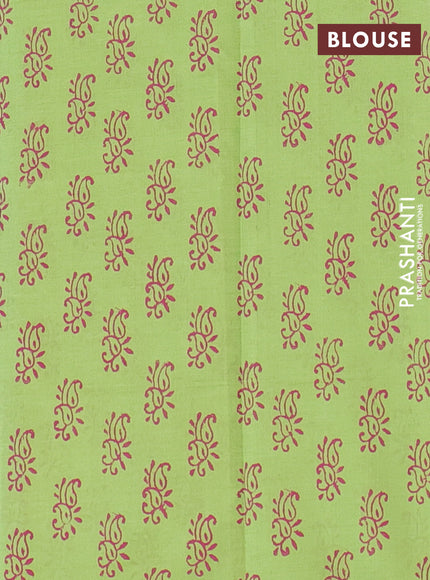 Semi silk cotton saree cream and light green with butta prints in borderless style