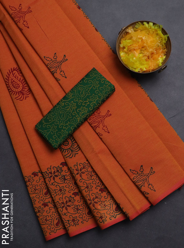 Semi silk cotton saree sunset orange and green with butta prints and printed border