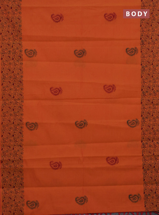 Semi silk cotton saree sunset orange and green with butta prints and printed border