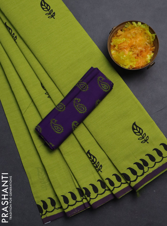 Semi silk cotton saree fluorescent green and violet with butta prints and printed border