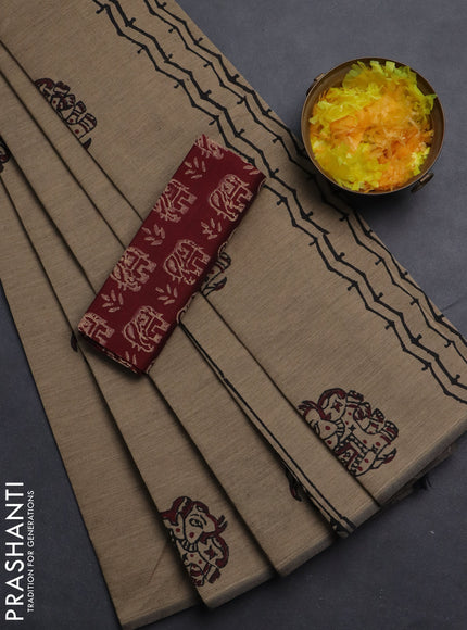 Semi silk cotton saree beige and maroon with elephant butta prints in borderless style