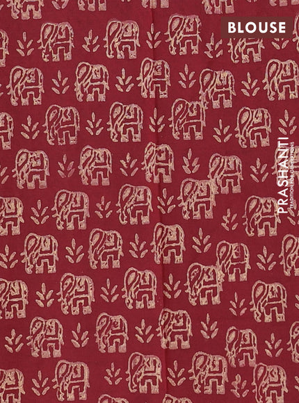 Semi silk cotton saree beige and maroon with elephant butta prints in borderless style