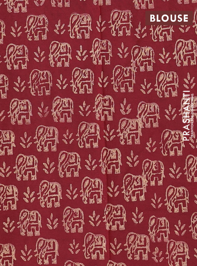 Semi silk cotton saree beige and maroon with elephant butta prints in borderless style