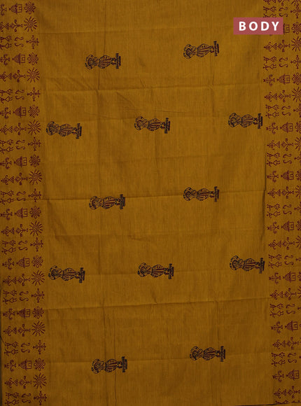 Semi silk cotton saree mustard yellow and maroon with allover warli prints and printed border