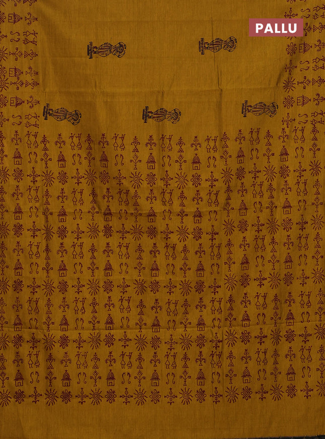 Semi silk cotton saree mustard yellow and maroon with allover warli prints and printed border