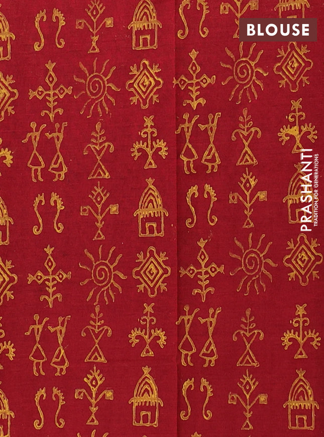 Semi silk cotton saree mustard yellow and maroon with allover warli prints and printed border