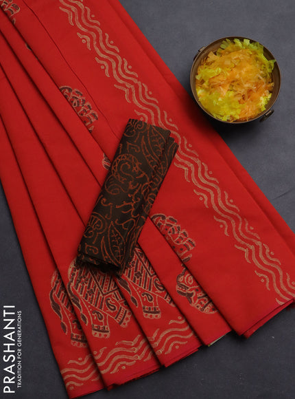 Semi silk cotton saree orange and dark brown with butta prints and printed border
