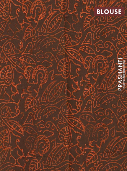 Semi silk cotton saree orange and dark brown with butta prints and printed border